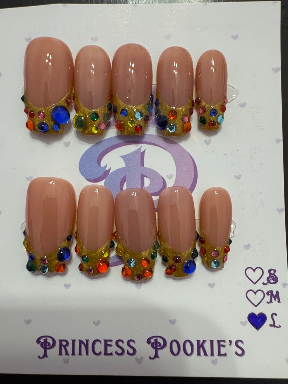 Nude Pink Press-On Nails with Gold French Tip and Multicolor Rhinestones